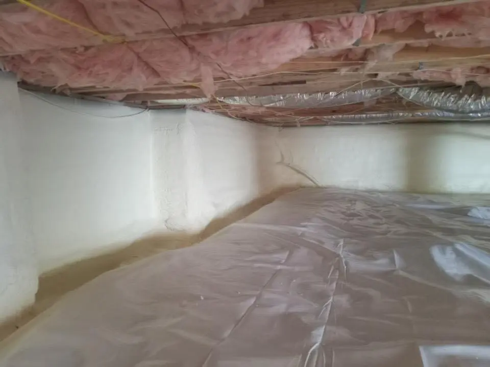 Crawl space encapsulation with closed-cell spray foam for Storm Damage Roof Repair in New Kingman-Butler